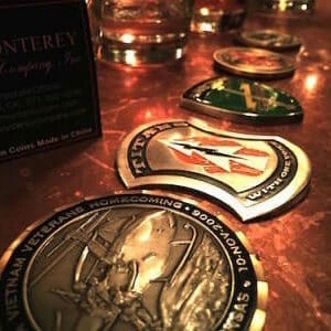 challenge coins on a bar