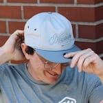 lifestyle shot with grey rope style hat