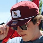 red rope hat with patch lifestyle photo