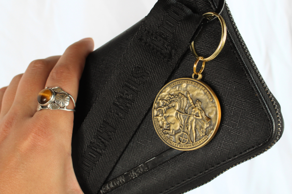 3D metal keychain on purse