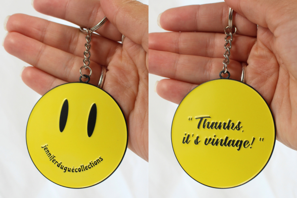 Smiles two-sided metal keychain